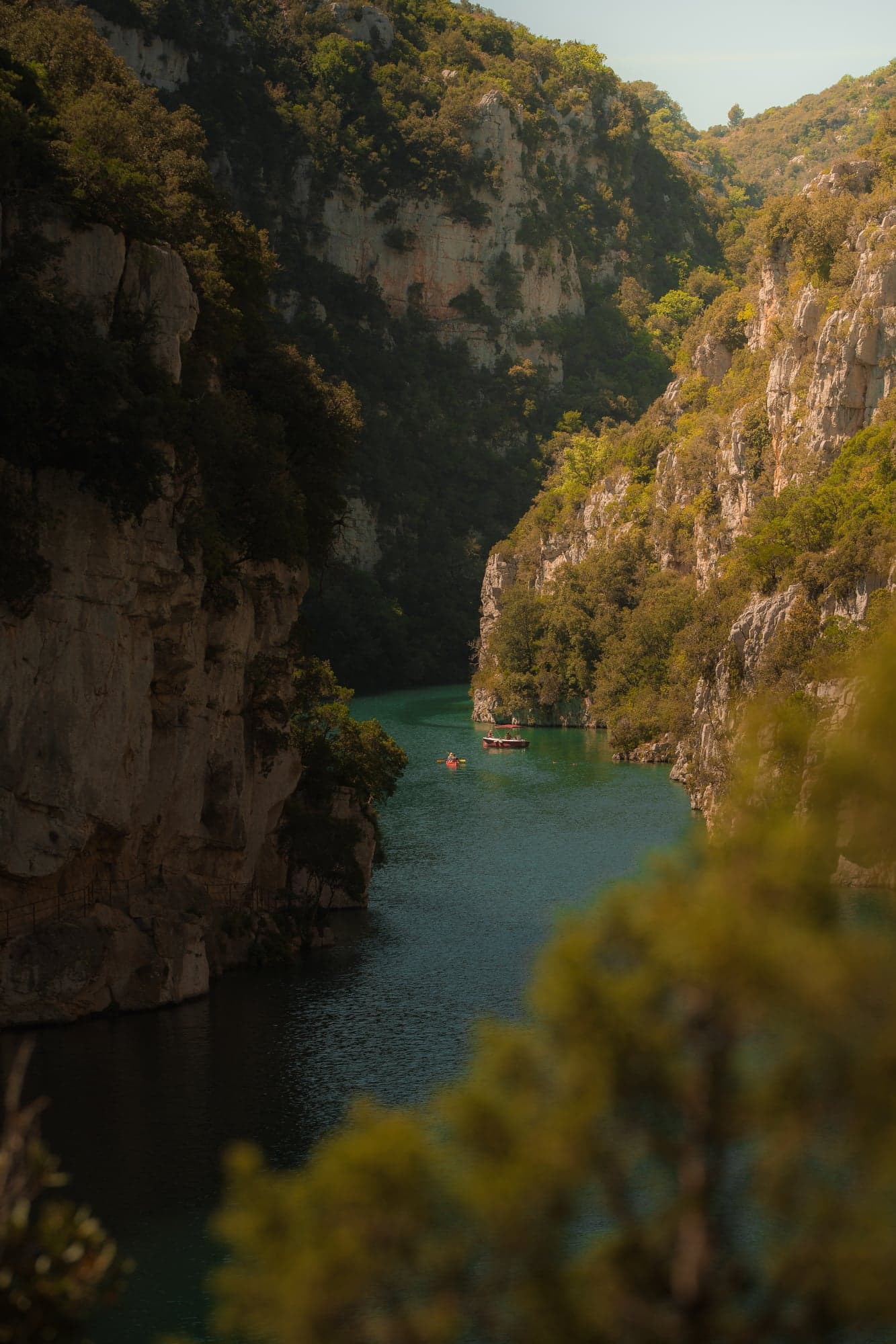 The Verdon Gorge, a canoe on turquoise water
