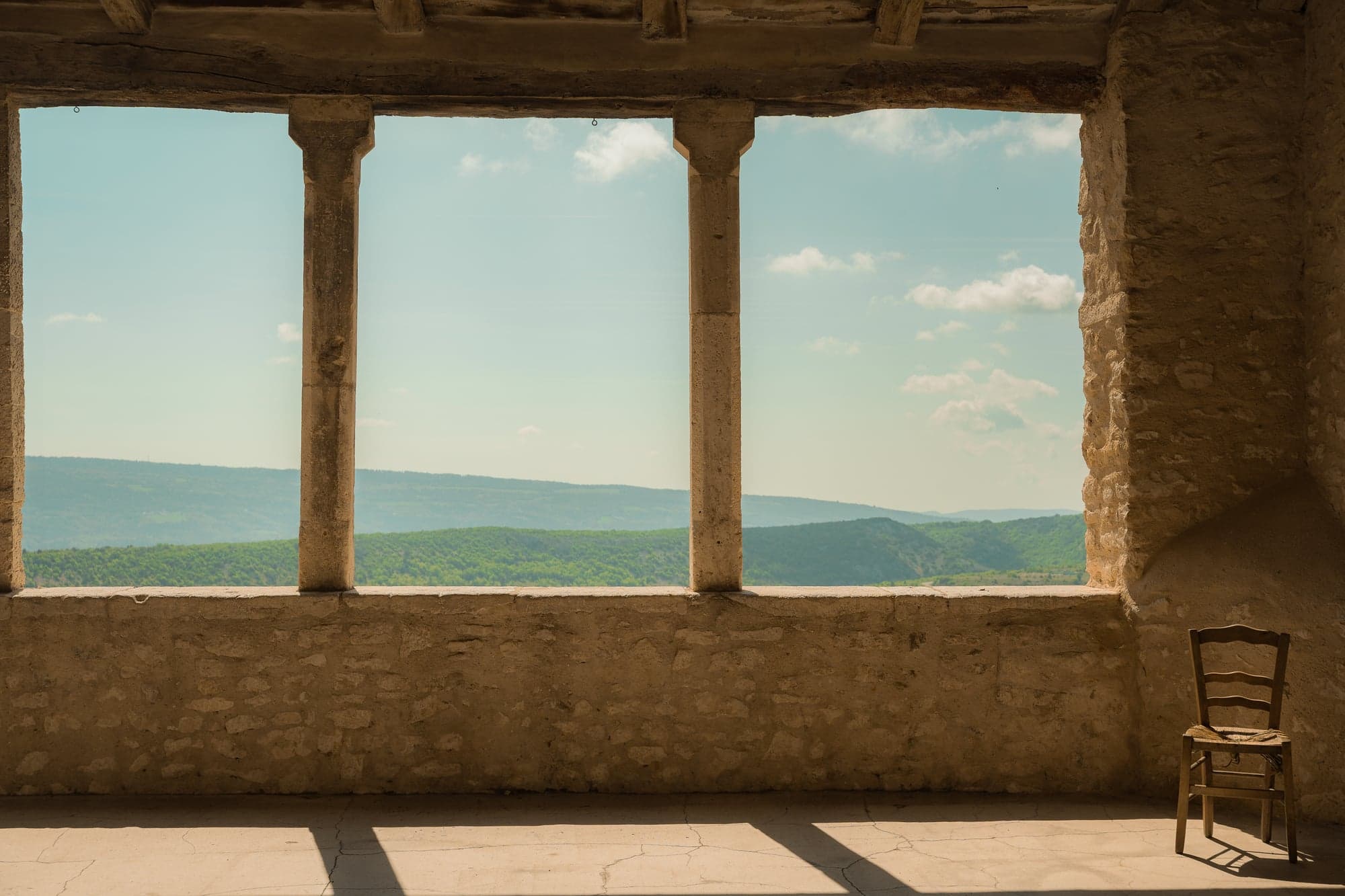 View over the Luberon hills from a stone farmhouse